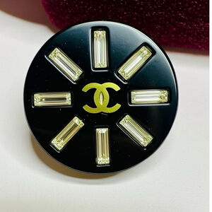 Chanel Cocktail Ring With A Black Resin Base Baguette-cut Crystals Iconic Logo